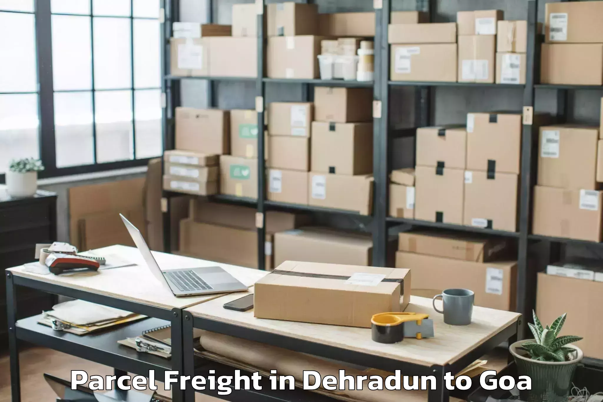 Reliable Dehradun to Queula Parcel Freight